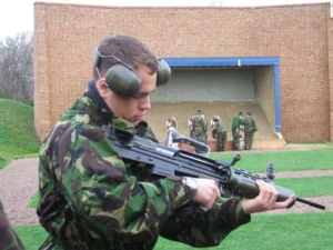 Cadet with L98a1 showing details of the Cocking handle and Sights (note the large Foresight Post).