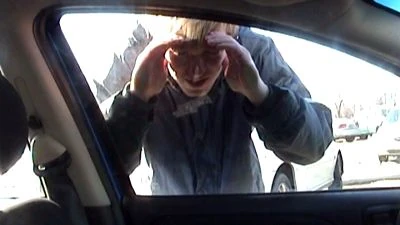 Too late, Tim (Tim Haas) discovers he's locked both his keys and his cell phone in his still-running car.