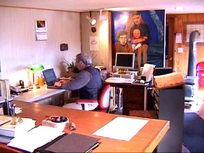 Novelist Larry Woiwode types on his computer in the office on his North Dakota ranch.