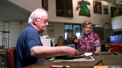 Professor Todd (Michael Harvey reviews the semester's work of anxious art student Monica (Nancy Monroe).