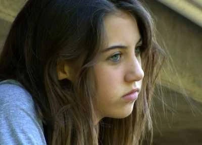 Ellie Unkenholz as Abbi in Dangers from Within