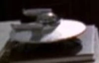 A model of a flying saucer.