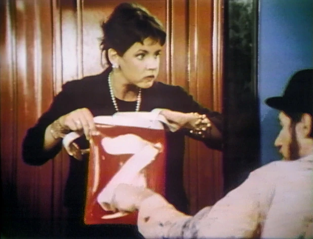 Stockard Channing, victimized by the Mad Painter