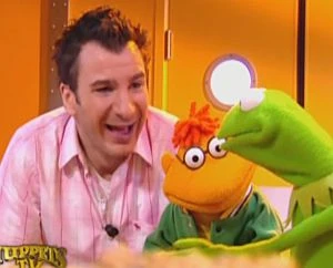 Youn with Scooter and Kermit