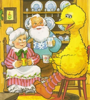 Big Bird relaxes with Santa and Mrs. Claus in Big Bird Meets Santa Claus
