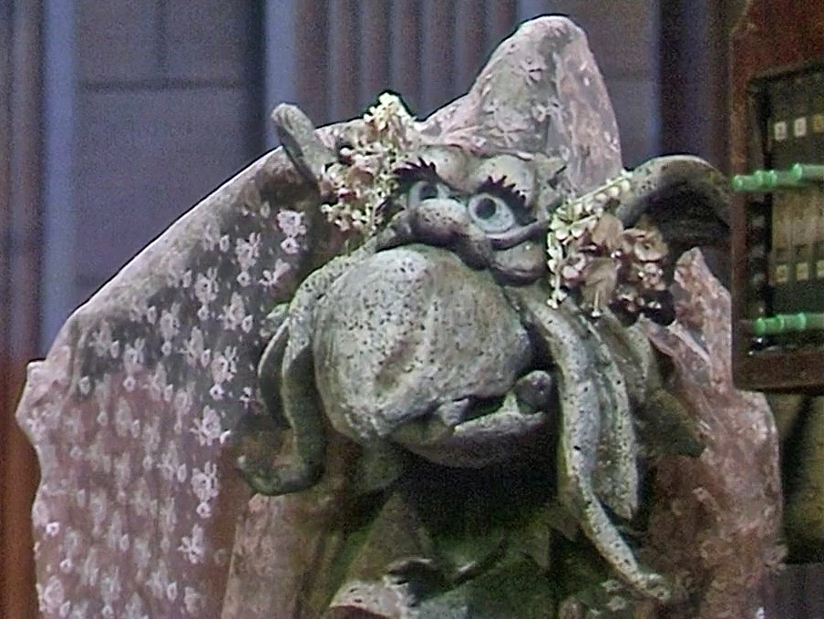 Mulch romances the Gargoyle.