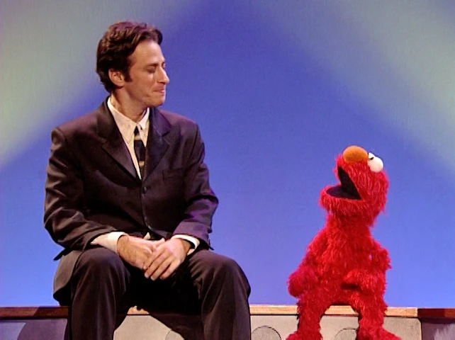 Jon Stewart and Elmo.