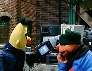 In Elmo Saves Christmas, Ernie and Bert catch a scene from It's a Wonderful Life.