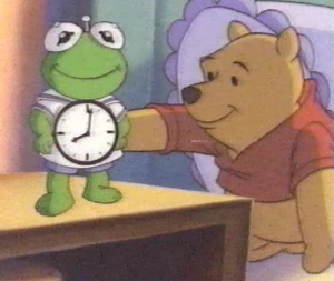 Pooh, about to awaken Kermit the Clock in Cartoon All-Stars to the Rescue