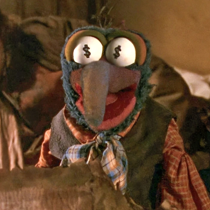 Gonzo, inflamed by the idea of accruing capital in Muppet Treasure Island