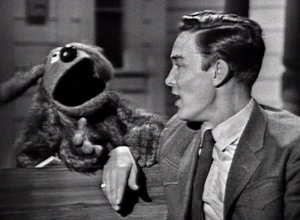 Rowlf and Jimmy Dean swing on a star.
