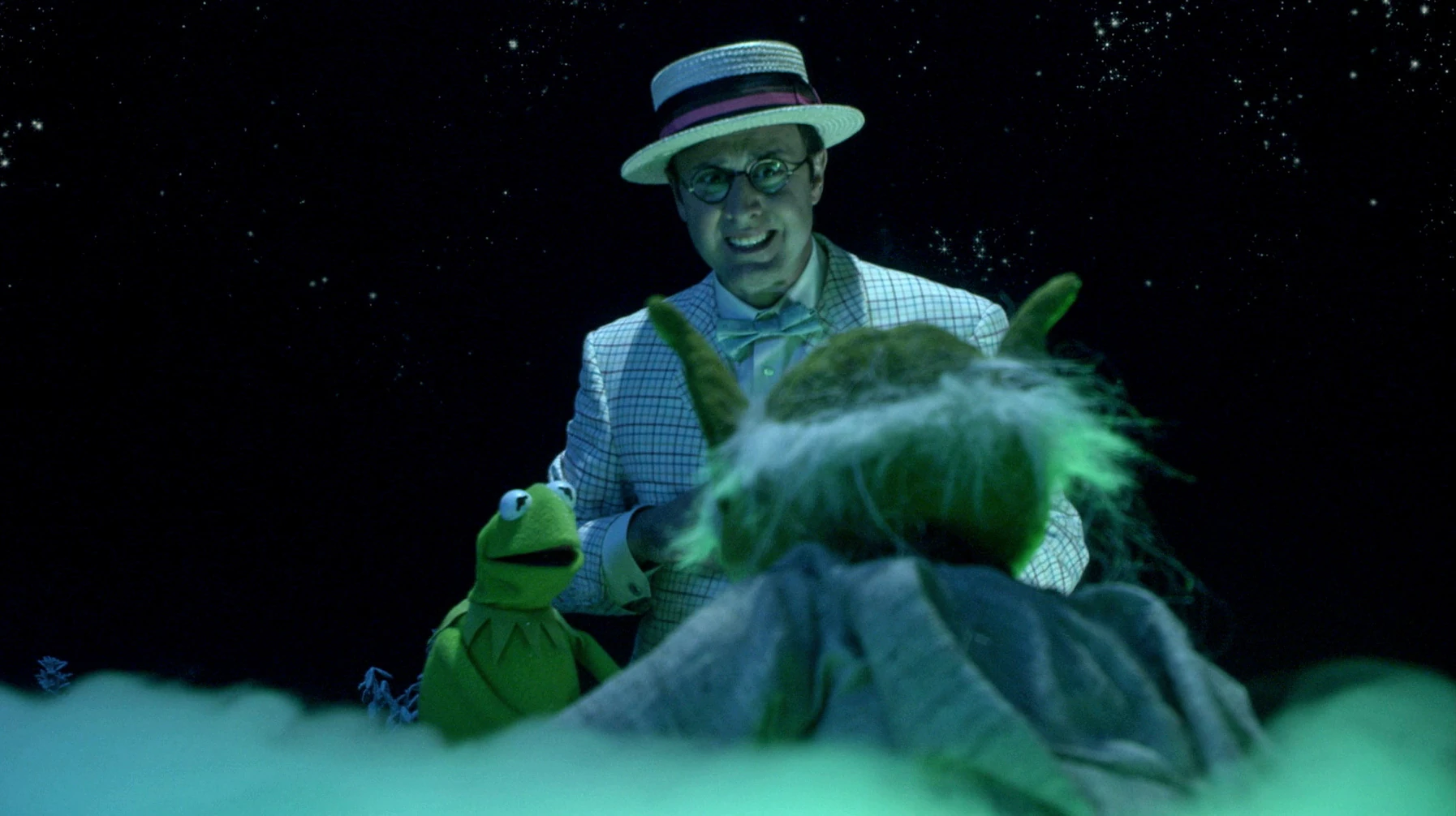 Daniel and Kermit are surprised to see Yoda in It's a Very Merry Muppet Christmas Movie