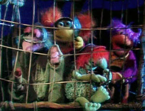 The captive Fraggles sing Fraggle Rock Rock.