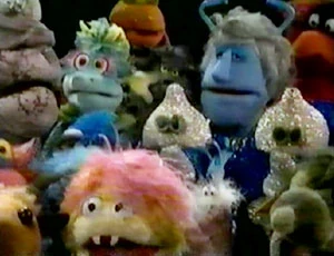 The alien audience is shocked to witness the fate of the pageant judges.