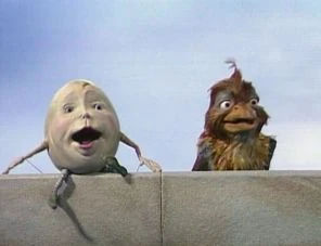 Prince Humpty Dumpty sits on the wall with Coutchie-Coulou