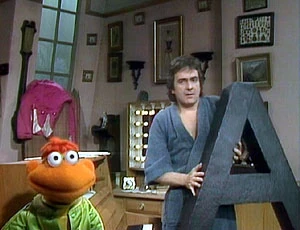 Dudley Moore asks Scooter to give him an A.