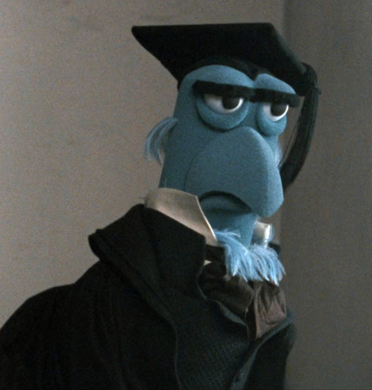 Sam the Eagle as Ebenezer Scrooge's headmaster.