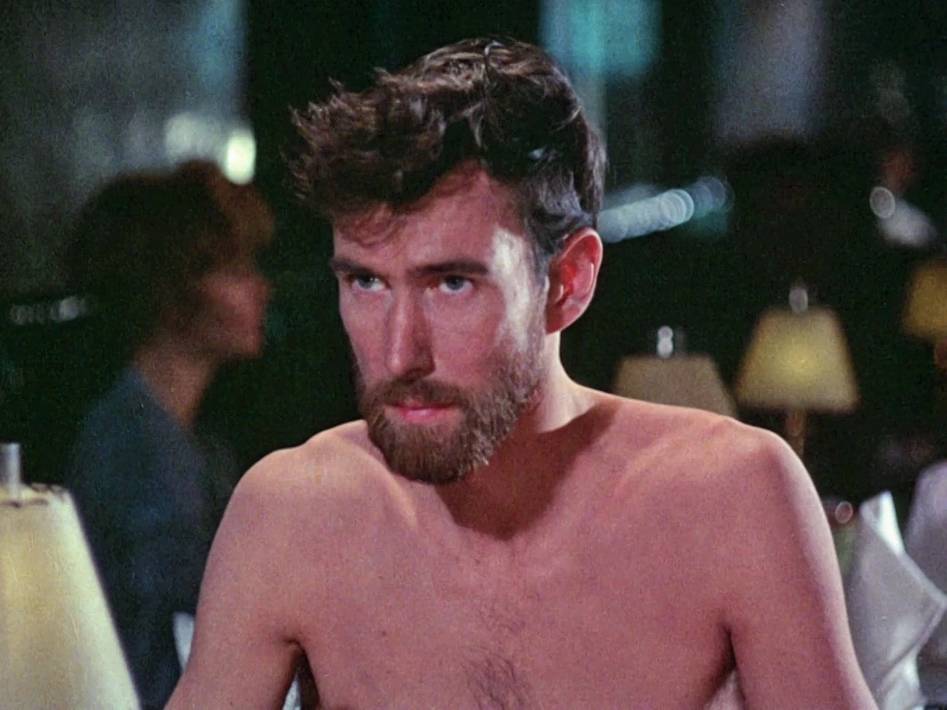 The Man, looking contemplative at the dinner table
