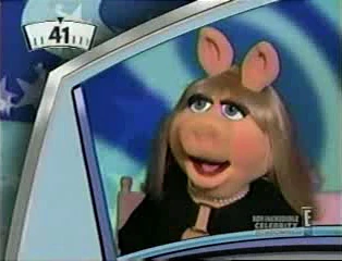 Miss Piggy doing what she does best: talking about herself.