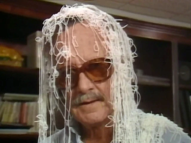 Stan Lee, coated with Baby Skeeter's webbing