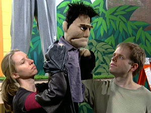 Alice Dinnean-Vernon, puppet Angel and Drew Massey.