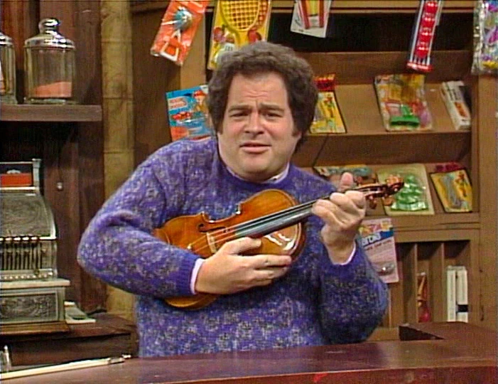 Itzhak Perlman in Hooper's Store, playing "Put Down the Duckie".