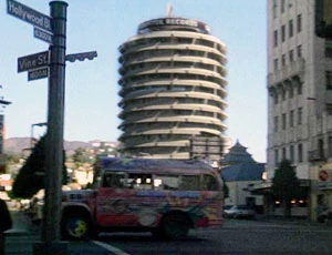 The Electric Mayhem bus crosses Hollywood and Vine, a popular spot for tourists.