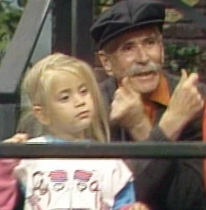Chet O'Brien, snapping fingers with one of the kids in The Sesame Street Special