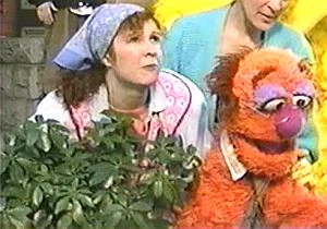 Cynthia Darlow, aghast with Mr. Monster