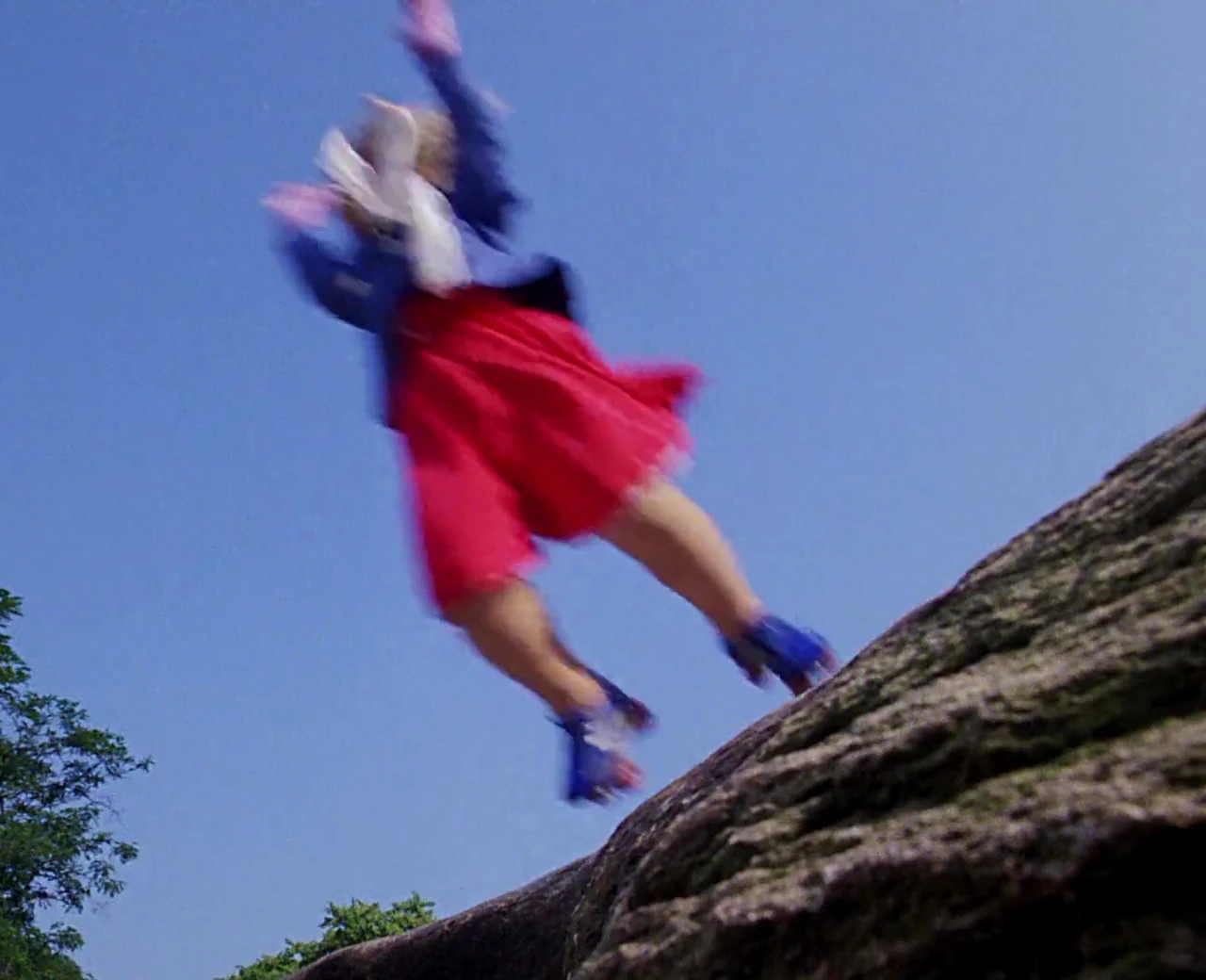 Miss Piggy leaping in Muppets Take Manhattan.