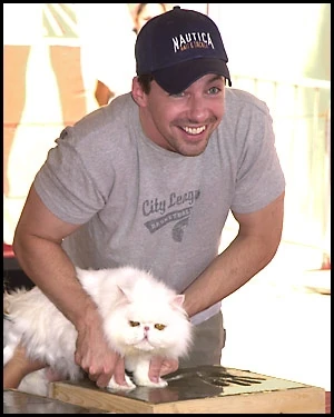 Sean Hayes, with Mr. Tinkles.