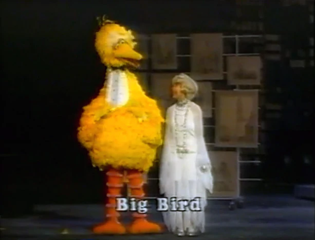 Big Bird and Carol Channing in 1985
