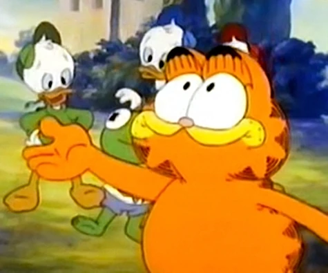 Garfield, upstaging Baby Kermit.