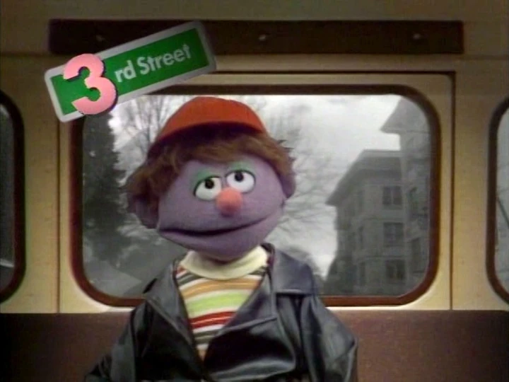 Farley (the lavender boy) singing "Forty Blocks From My Home."