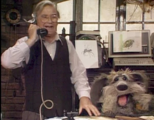 Doc, inadvertently revealing his affection for Ms. Ardath over the phone, much to Sprocket's amusement