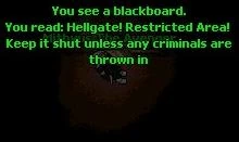 A warning sign at the (dimly lit) entrance to Hellgate.