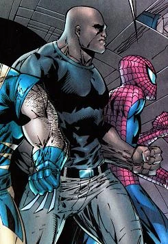 Dammit, Cage, everyone else has a superhero costume.  At least wear a tiara or something.